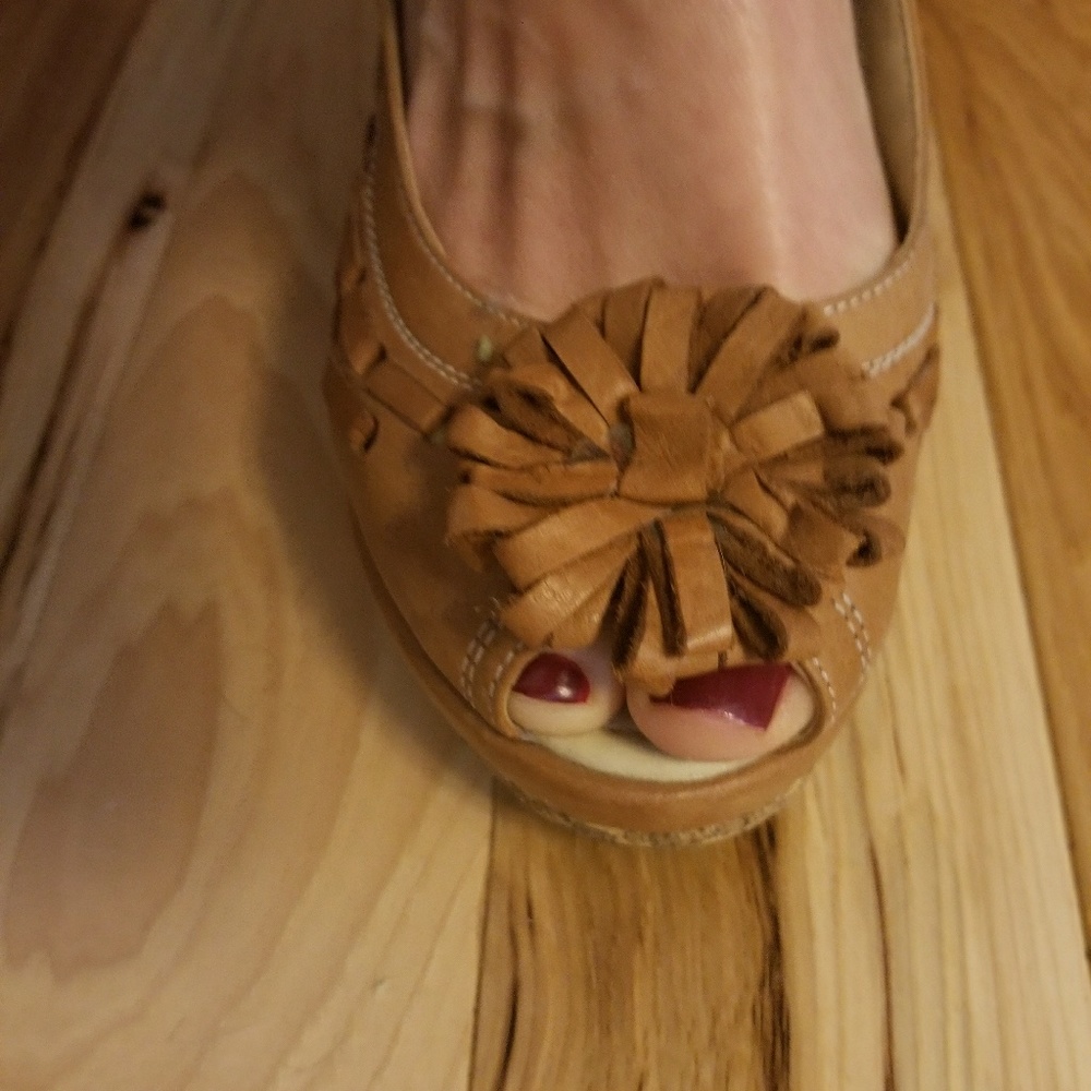 Tan peeptoe cork wedges